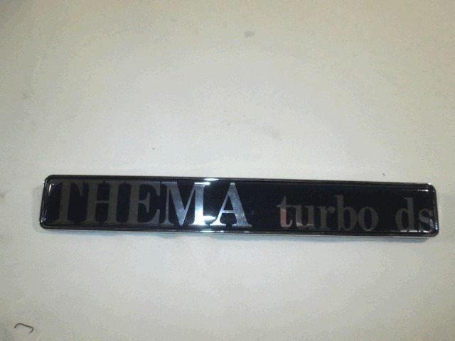 82434199 TARGHETTA SCRITTA STEMMA "THEMA TURBO DS" LANCIA THEMA 2.0 I.E. RICAMBIO NUOVO